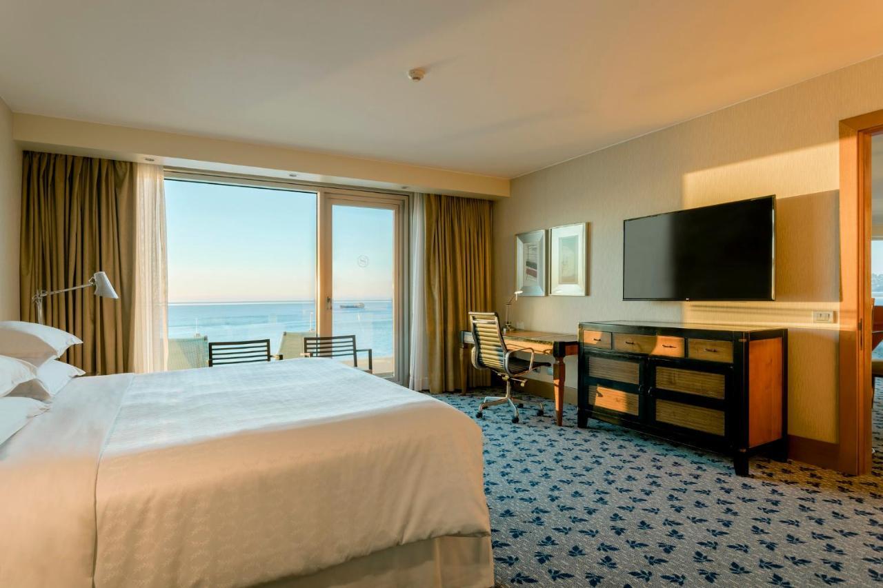 Präsidentensuite mit 1 Schlafzimmer mit Kingsize-Bett und Balkon